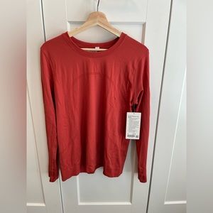 Women’s Run Swiftly Relaxed long sleeve Size 10